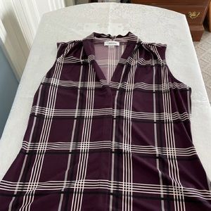 Great top for the summer to go with pants or skirt. In excellent condition.